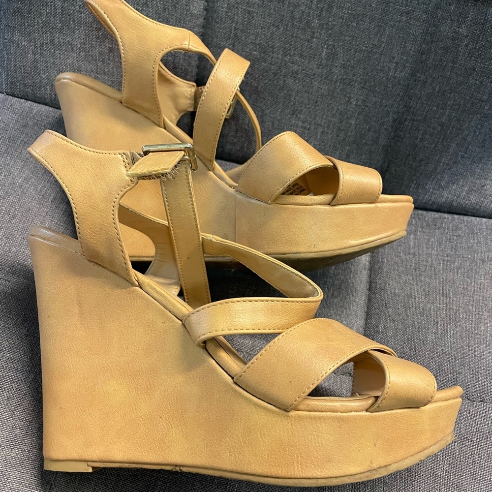 Tan wedges. Super comfortable. Worn twice.